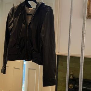 Black leather jacket from Mike & Chris. Size M.